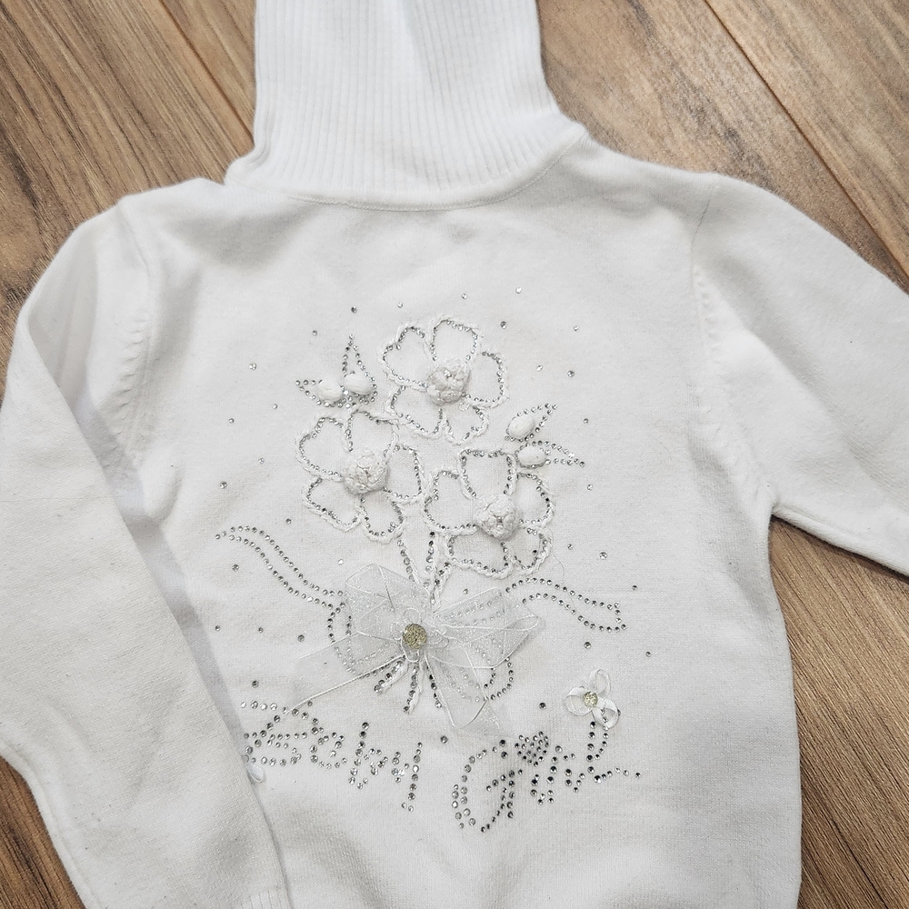 White Turtleneck Sweater with Floral Design